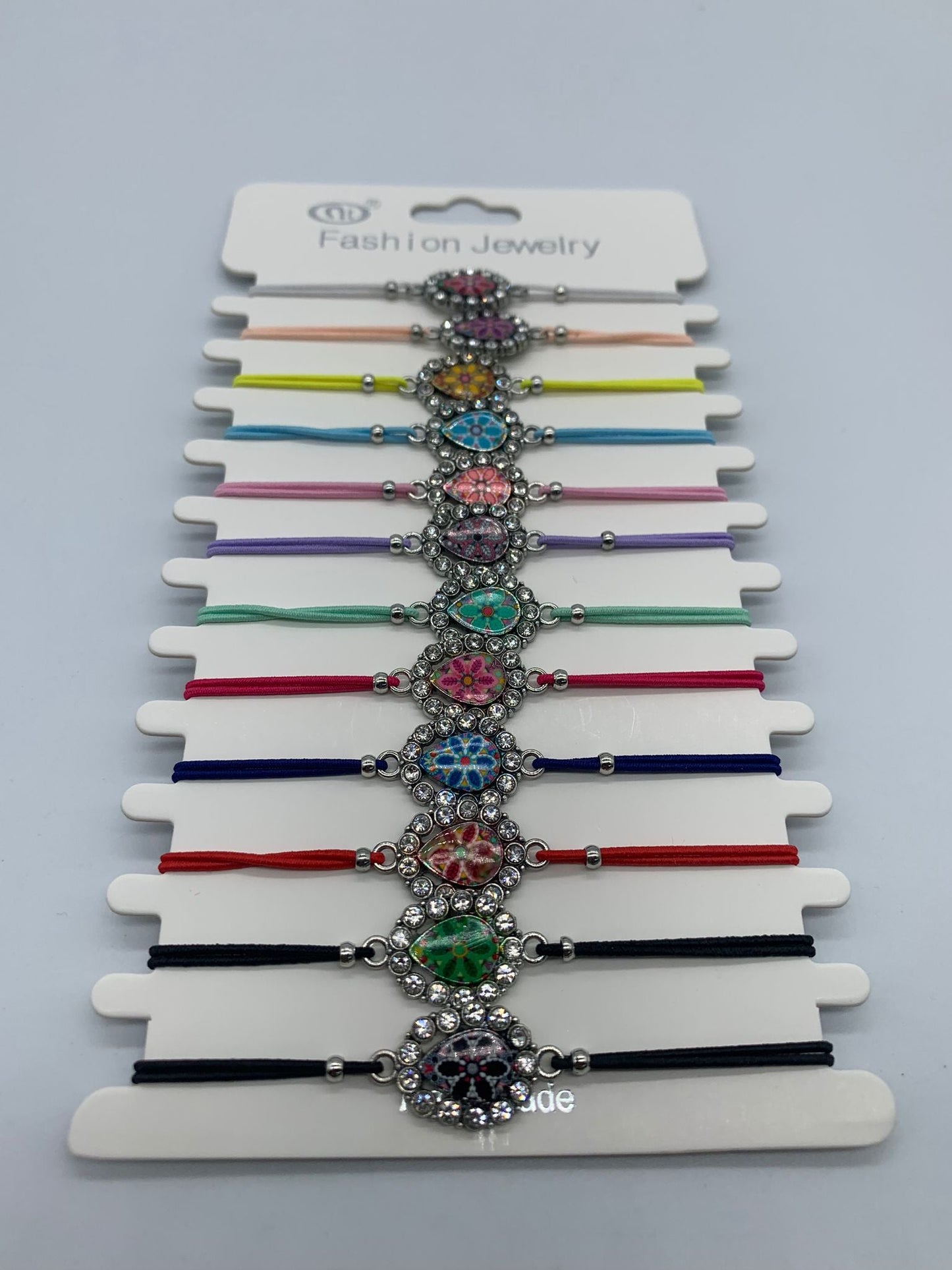 Pop of Color and Style with Our Colorful Cord Bracelets with Silver Colored Decorative Flower wholesale